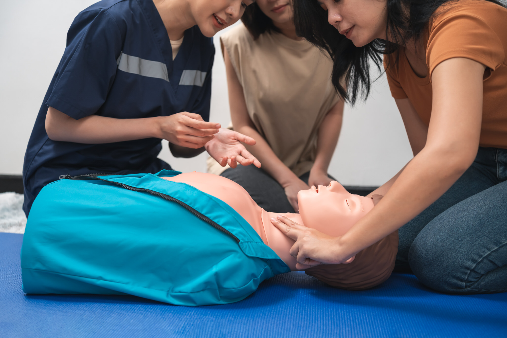 CPR Training ,Emergency and first aid class on cpr doll, Cardiopulmonary resuscitation, One part of the process resuscitation on unconscious person.